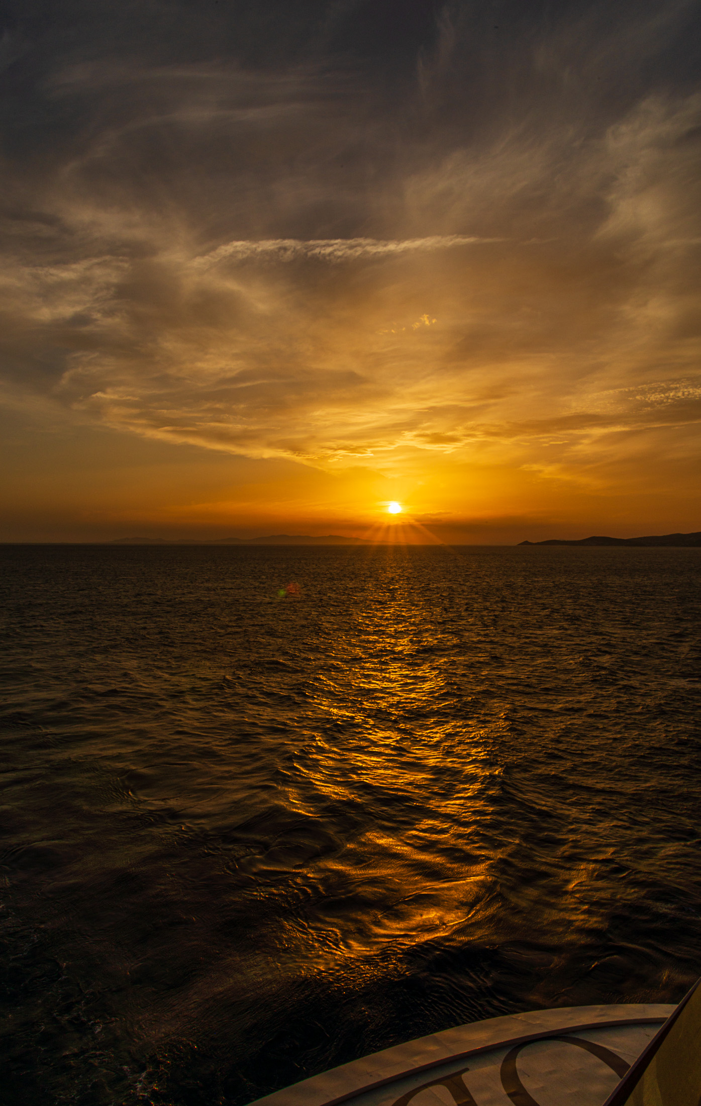 Cruise ship aft at sunset